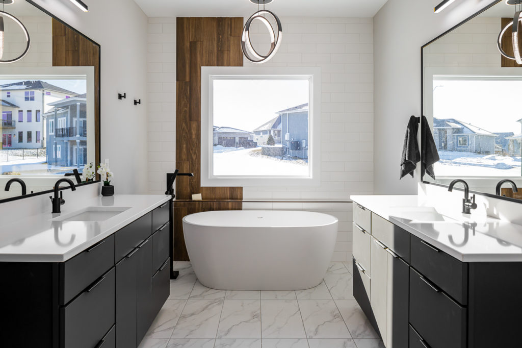 Modern soaker tub design by KRM custom homes