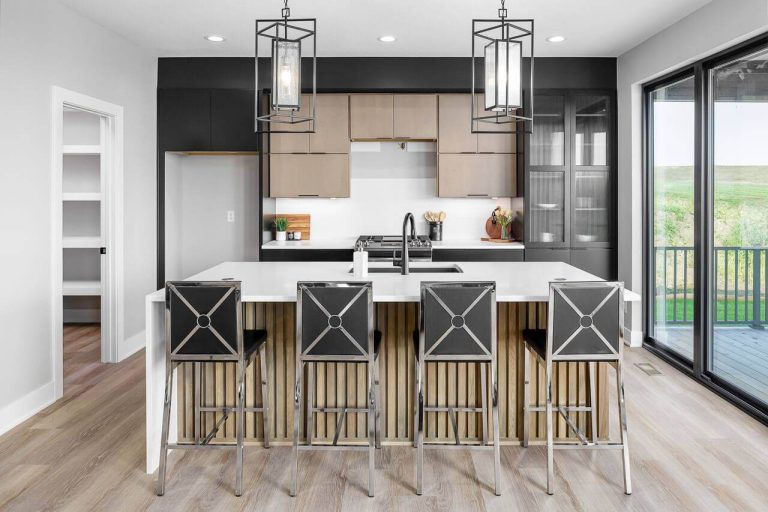Modern kitchen with black and brown cabinets. detailed custom island