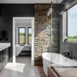 Soaker tub with a wall accent