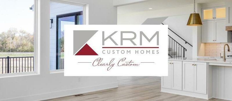 beautiful kitchen design with a clearly custom KRM logo over top